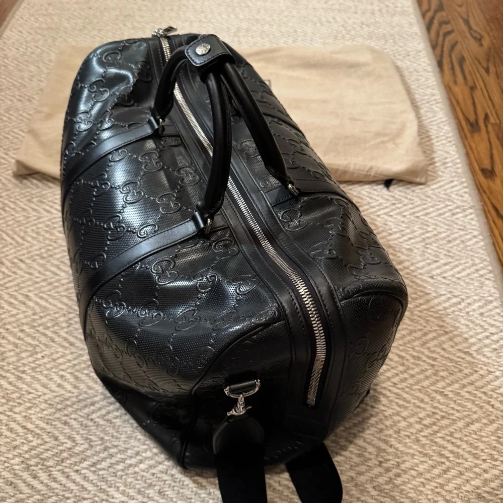 New! Gucci GG embossed black leather duffel bag